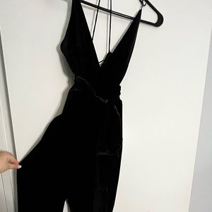 Criss cross Velvet black jumpsuit. Size 4